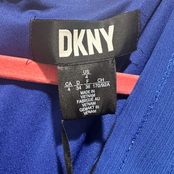 DKNY Blue “fake” wrap w/ belt.
handkerchief hem/midi length - Picture 3 of 5